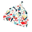 Colorful baby hat with nautical-themed pattern on a light background