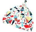 Colorful baby hat with nautical-themed pattern on a white background
