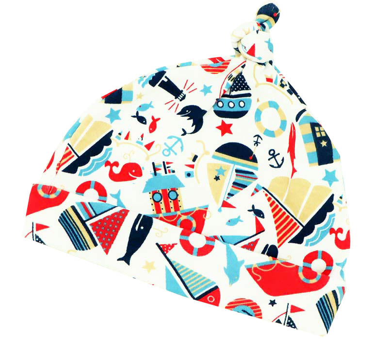 Colorful baby hat with nautical-themed pattern on a white background