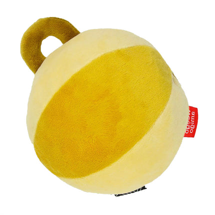 Yellow plush toy with a red tag on a white background