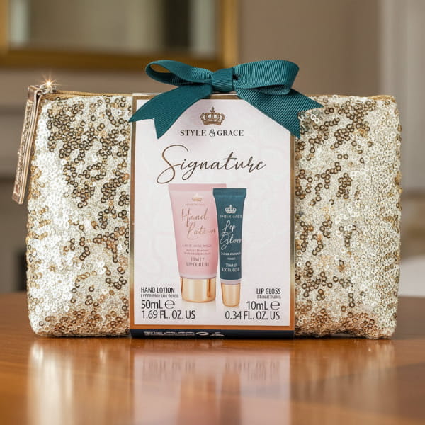 Cosmetic set with 'Style & Grace' branding in a decorative box on a table surface