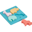 Colorful silicone mold with animal-shaped puzzle on a white background