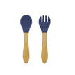 Navy blue spoon and fork with wooden handles on a white background
