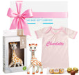 Baby gift set with Sophie la girafe, pink top, chocolates and The Baby Gift Company gift box