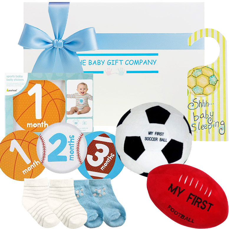 Baby milestone items with sports-themed balls and baby socks, branded 'The Baby Gift Company'.