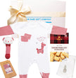 Baby gift set with onesie, rattle, socks, and cookies from The Baby Gift Company.