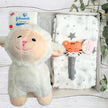 Johnson's baby soap with a plush lamb toy and baby blanket in a baby gift box.