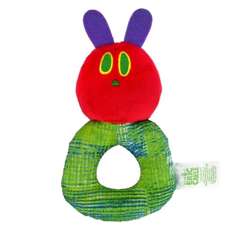 Plush toy with a red face and green body on a white background