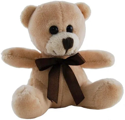 Plush teddy bear with a brown bow on a white background
