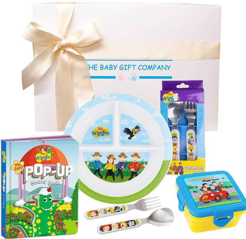 Baby gift set with plate, utensils, bib, and blanket from The Baby Gift Company.