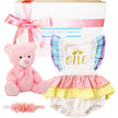 Baby gift set with pink teddy bear, colorful baby romper, and headband from The Baby Gift Company.