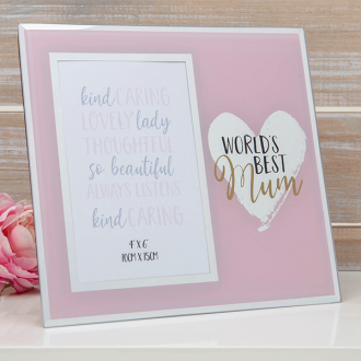 Framed print with 'Worlds Best Mum' text and heart design on a pink background