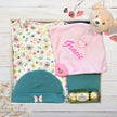 gift set with baby clothes and pink bear