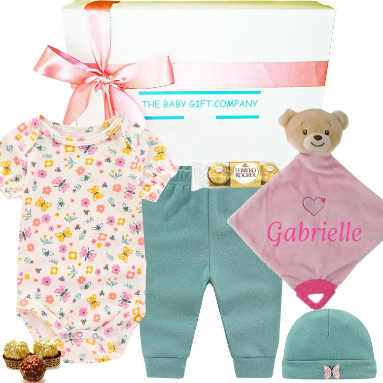 baby gift set with girl clothing and teddy