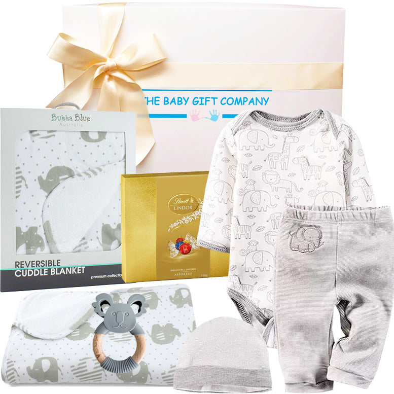 Baby gift set with clothing, toys, and products from The Baby Gift Company.