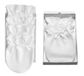 White baby mittens with lace details in a box on a white background