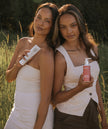 Ladies holding ANNA’S Wild Yam Cream & ANNA’S Magnesium Bedtime Lotion