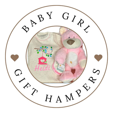 baby girl gift hamper with teddy and baby clothing