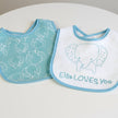Baby bib with 'Ellee LOVES YOU' text on a white background