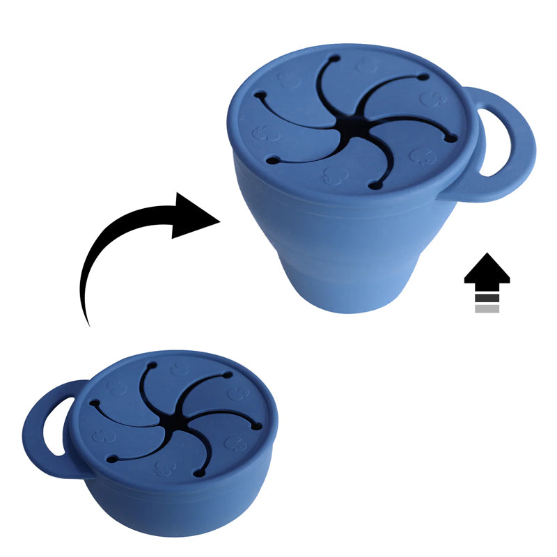 Blue silicone cup with lid on a white background