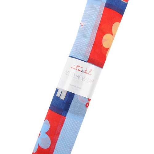 Colorful muslin wrap with heart patterns on a white background