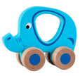 Blue elephant-shaped toy with wooden wheels on a white background