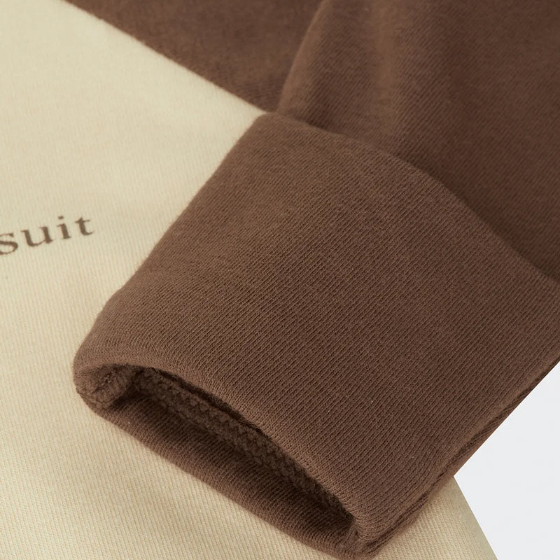 Brown Bonds Zip Wondersuit on a white background