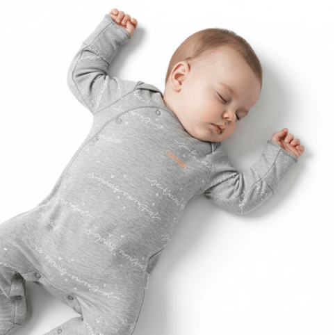sleeping baby wearing bonds grey suit