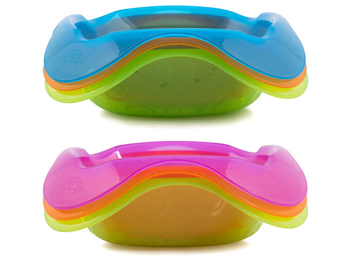 Two colorful plastic shakers on a white background