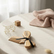 brush set and blanket on table