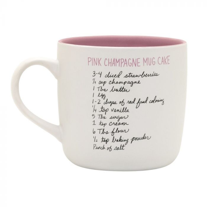 White mug with pink interior and recipe text on a white background