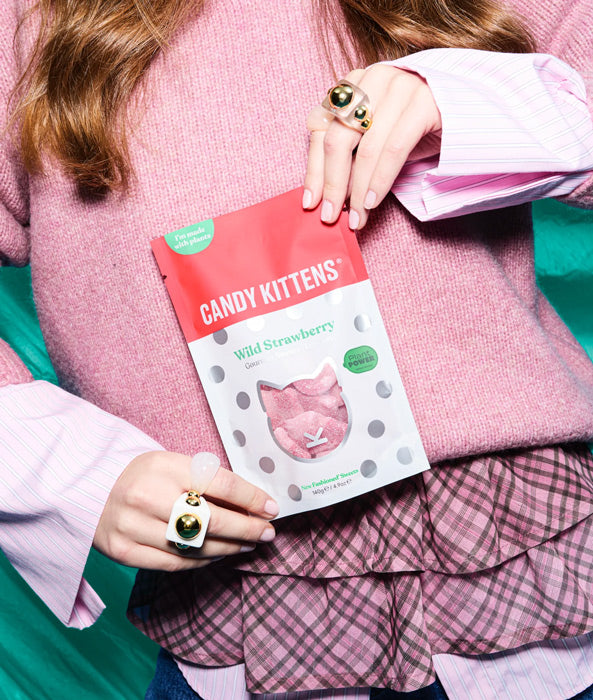 lady holding Candy Kittens Wild Strawberry gourmet vegan sweets