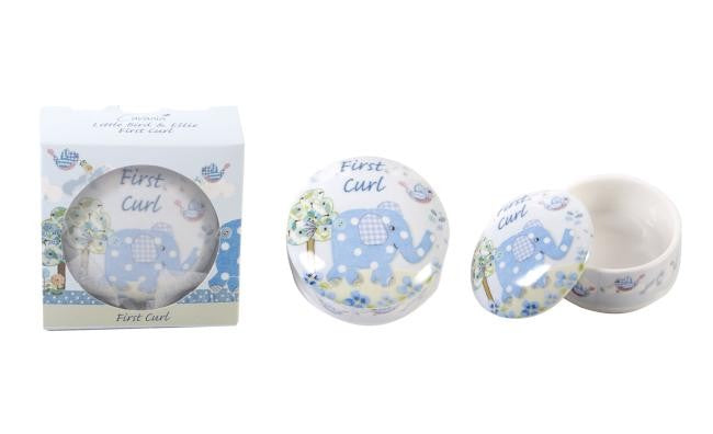 Set of baby-themed containers with elephant design and 'First Curl' text on a white background
