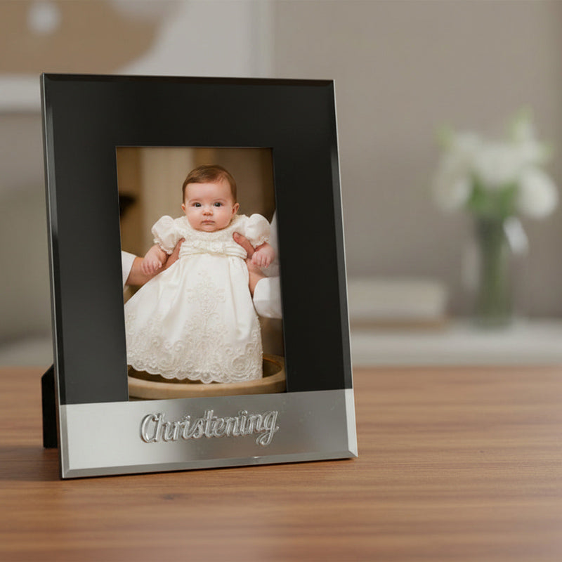 Black and silver photo frame with 'Artique' branding and 'Christening' engraving.
