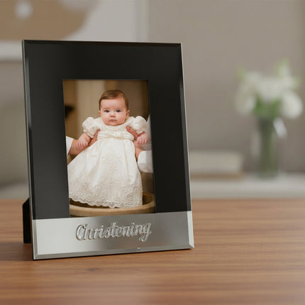 Black and silver photo frame with 'Artique' branding and 'Christening' engraving.