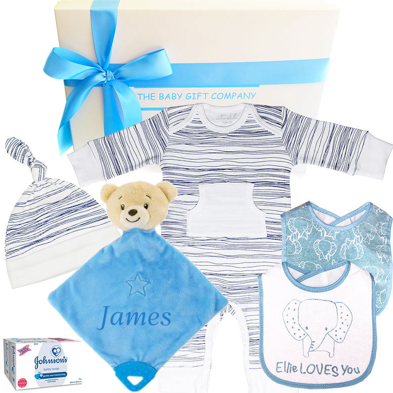 gift set with baby clothes and baby bibs
