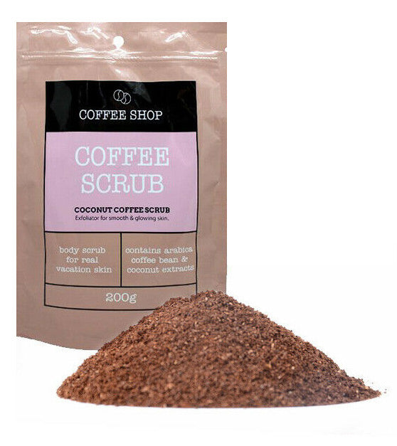 Coffee scrub packaging with a pile of coffee grounds on a white background