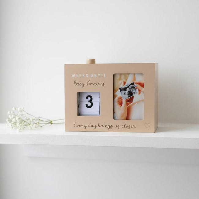 Baby Countdown Box with ultrasound photo frame on a shelf