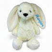 Cream bunny toy with name Adam embroidered on ear on a white background