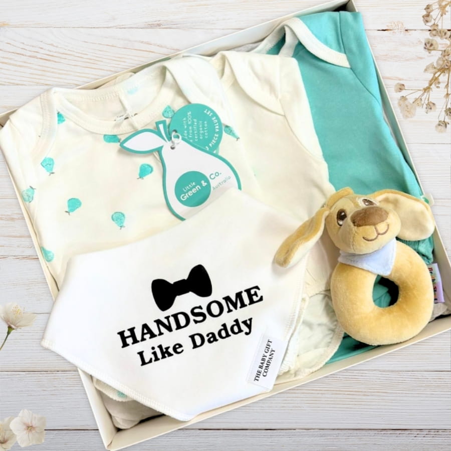 Baby clothing set with patterned rompers, and 'Handsome Like Daddy' bib in a box.