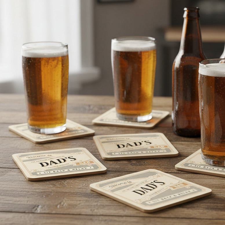 beers and dad coasters on wooden table