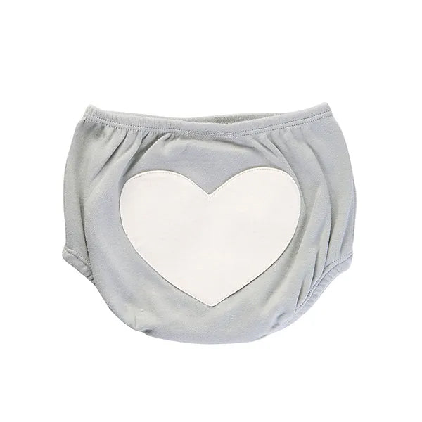 Gray diaper cover with a white heart design on a white background