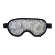 Silver glittery eye mask on a white background