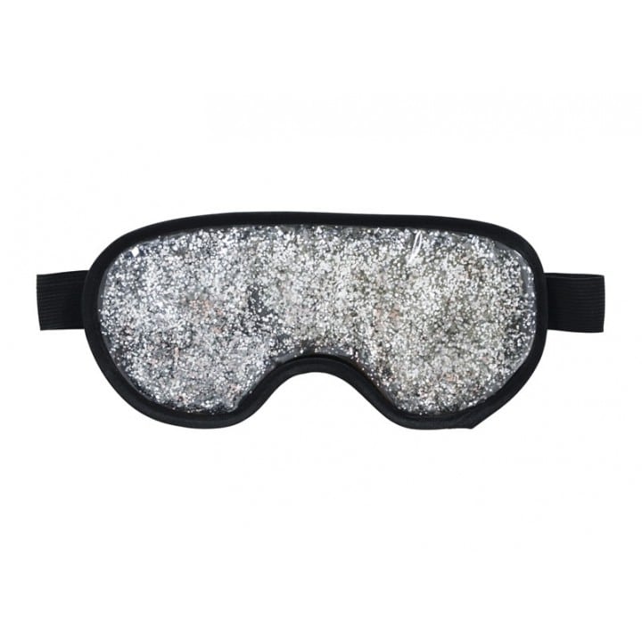 Silver glittery eye mask on a white background