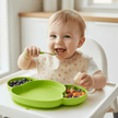 green koala silione plate and baby on table