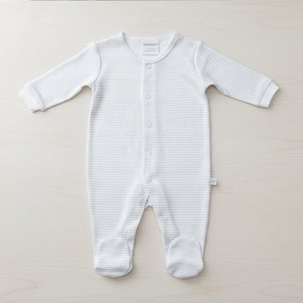 White baby onesie with thin gray stripes on a white background