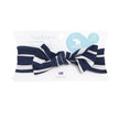 Navy and white striped headband with packaging on a white background