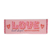 Box of heart-shaped bath fizzers with 'LOVE' text on a pink background