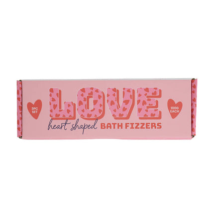 Box of heart-shaped bath fizzers with 'LOVE' text on a pink background