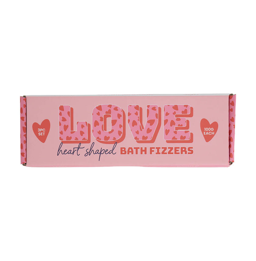 Box of heart-shaped bath fizzers with 'LOVE' text on a pink background
